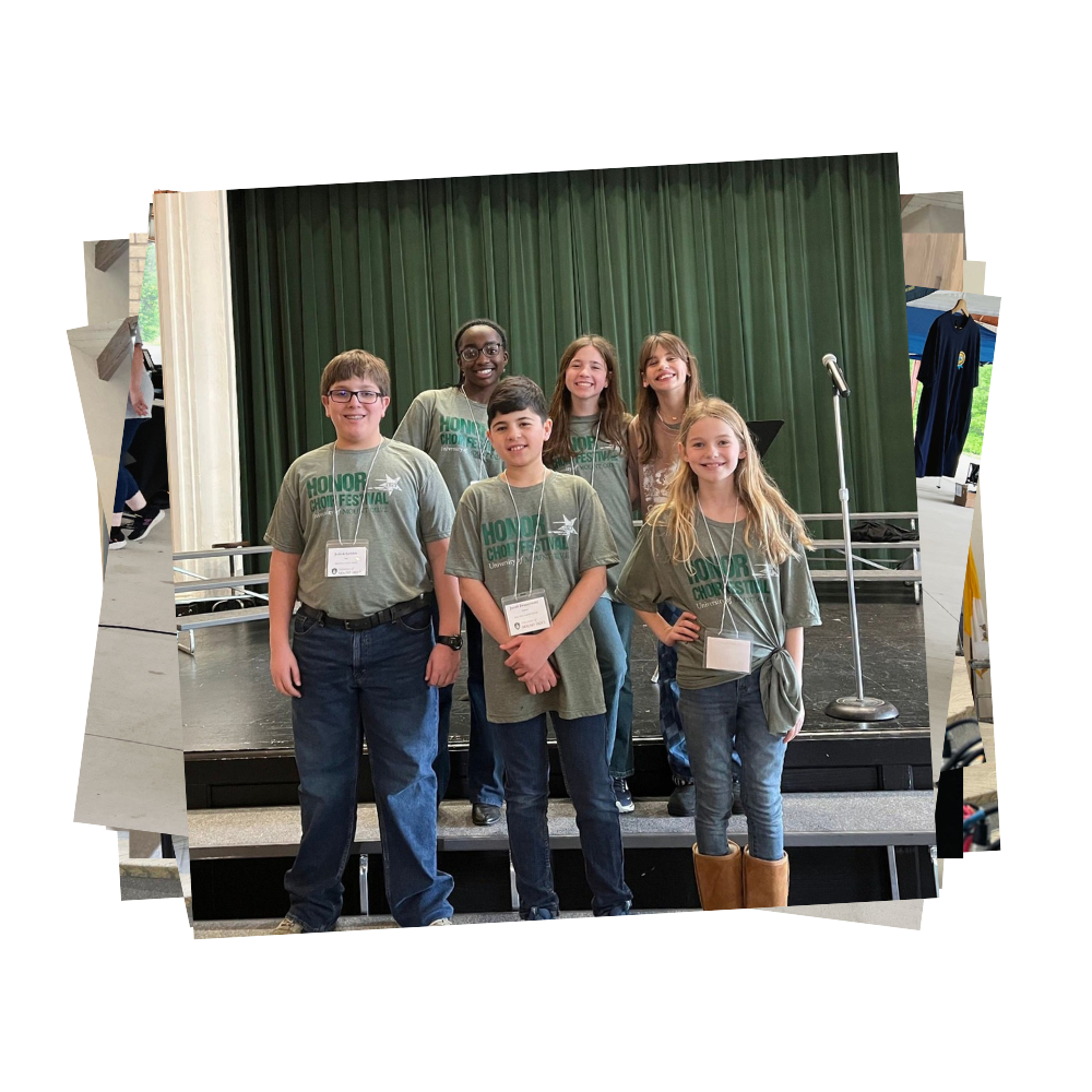 Choir members stand in front of stage at choir festival