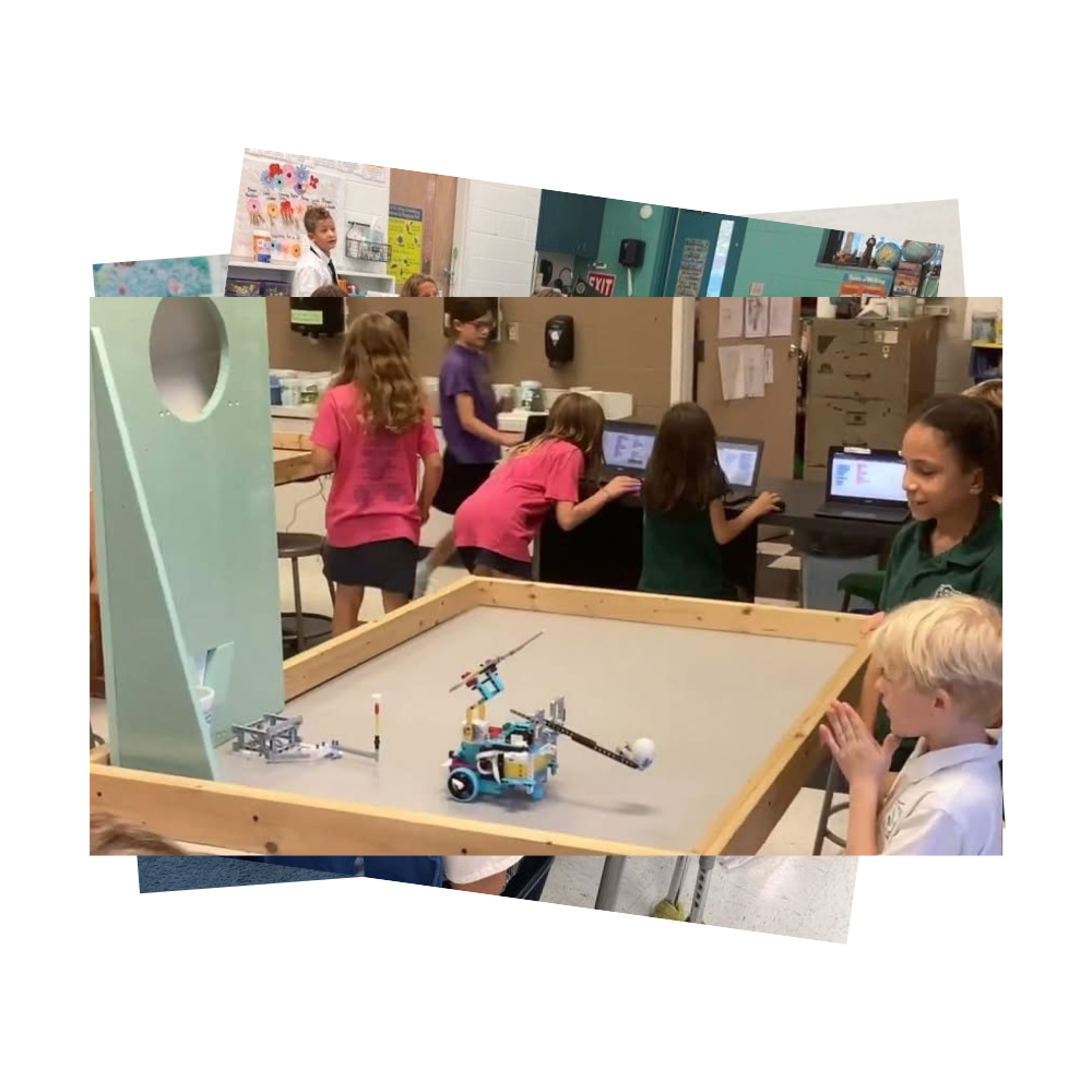 Students watch to see if robot they built will launch bal through cut out hole