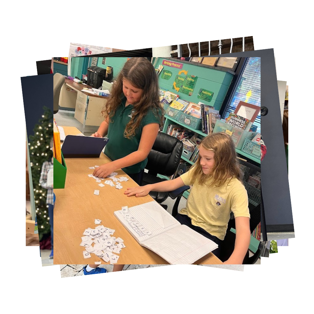 Students looking at cut out letters on a desk