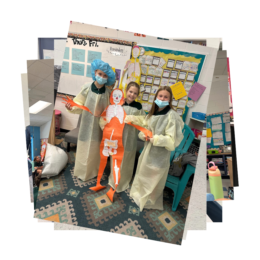 Students dress as doctors and hold a skeleton made out of orange and white construction paper