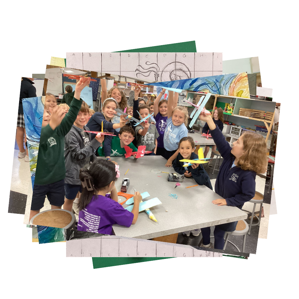 Students hold up airplane models in art class