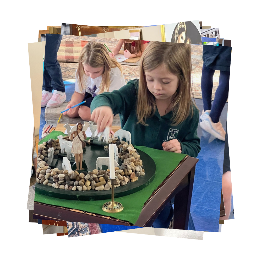 Student playing with sheep at Good Shepherd display in Catechesis of the Good Shepherd atrium