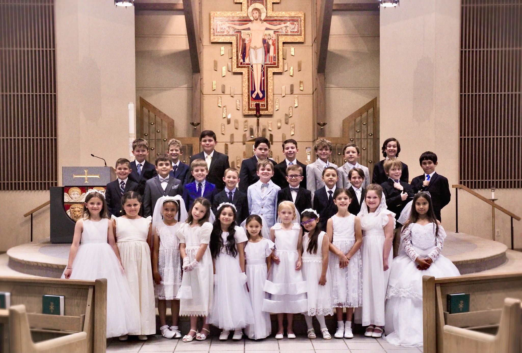 Catholic school First Holy Communion group photo in front of altar at St. Peter Catholic Church