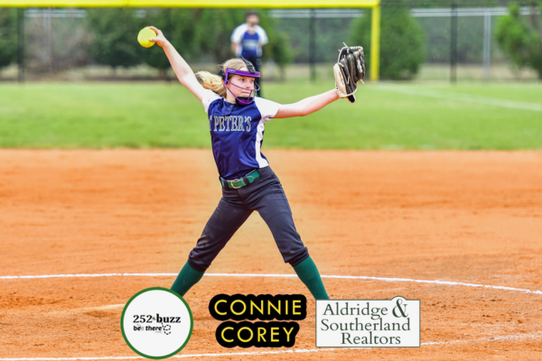 SPCS softball player winding up for a pitch