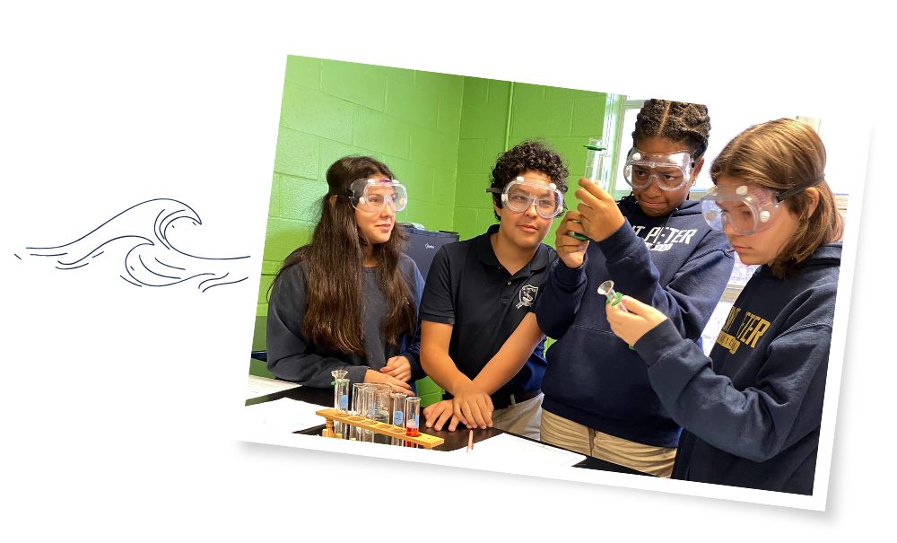 Catholic school students in science class examining beakers