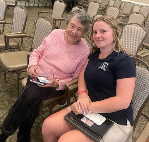 cypress glen resident and st. peter student smile at the camera