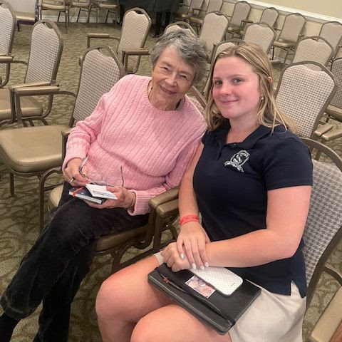 cypress glen resident and st. peter student smile at the camera